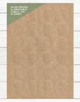 runde Kraftpapier Etiketten 40 mm Durchmesser zum selber drucken mit 24 Etiketten pro Blatt. Platziert auf einem weißen Holzuntergrund