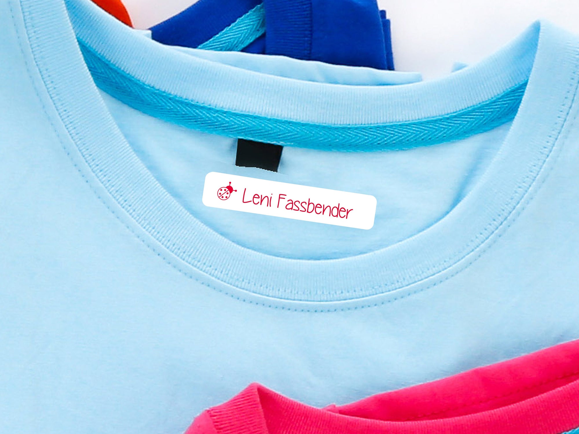 personalisierte Bügeletiketten mit Namen und Marienkäfer in 7 Farben - watsonlabel
